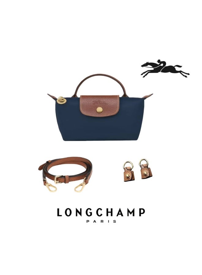 Longchamp Le Pliage Original comes in a small bag with a handle and a shoulder strap  Navy Blue- recycled canvas - Image 1